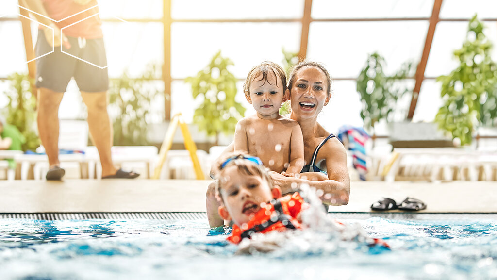 Family in swimming pool